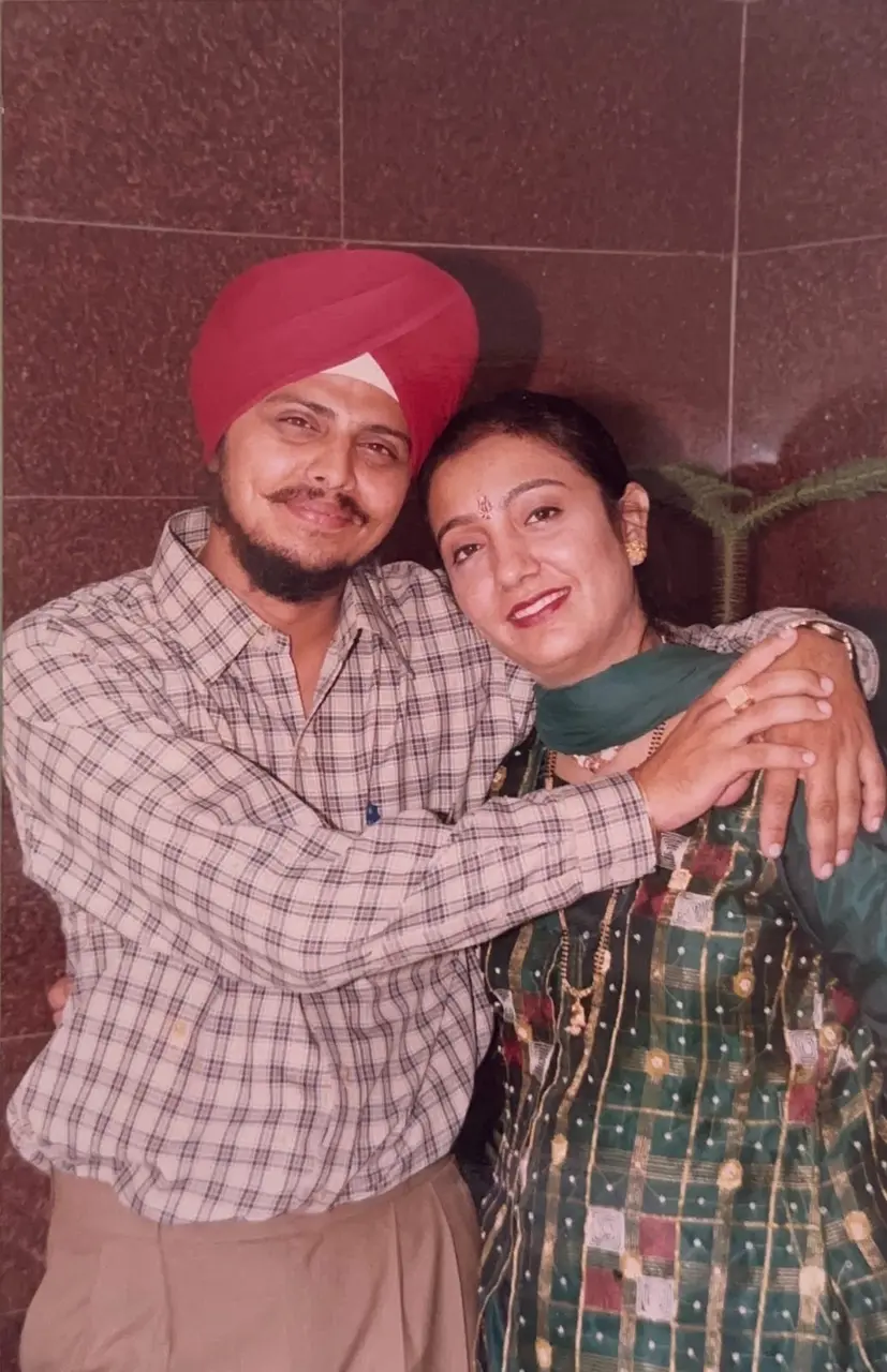 A couple smiling together, a family portrait