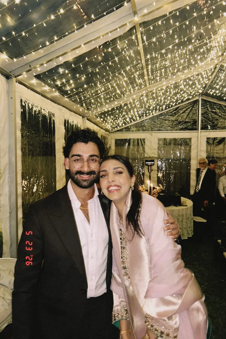 Karan and Supreet at their roka, under fairy lights